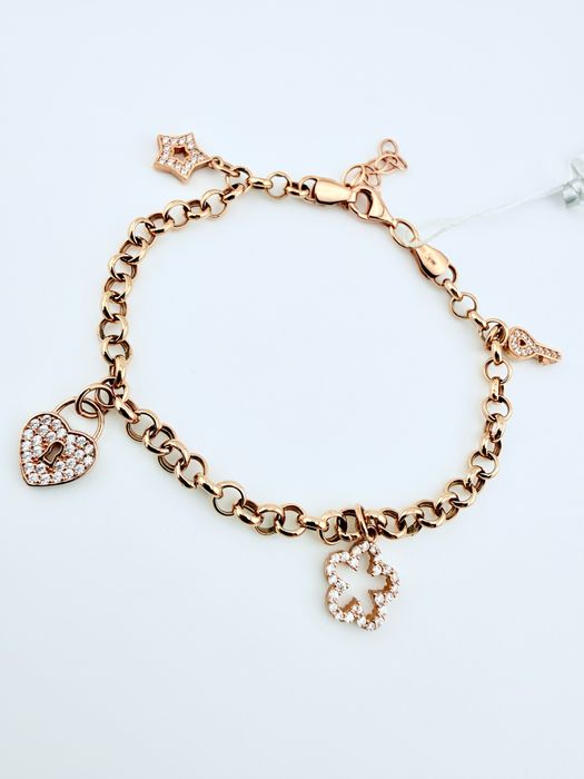 Золоті браслети нові