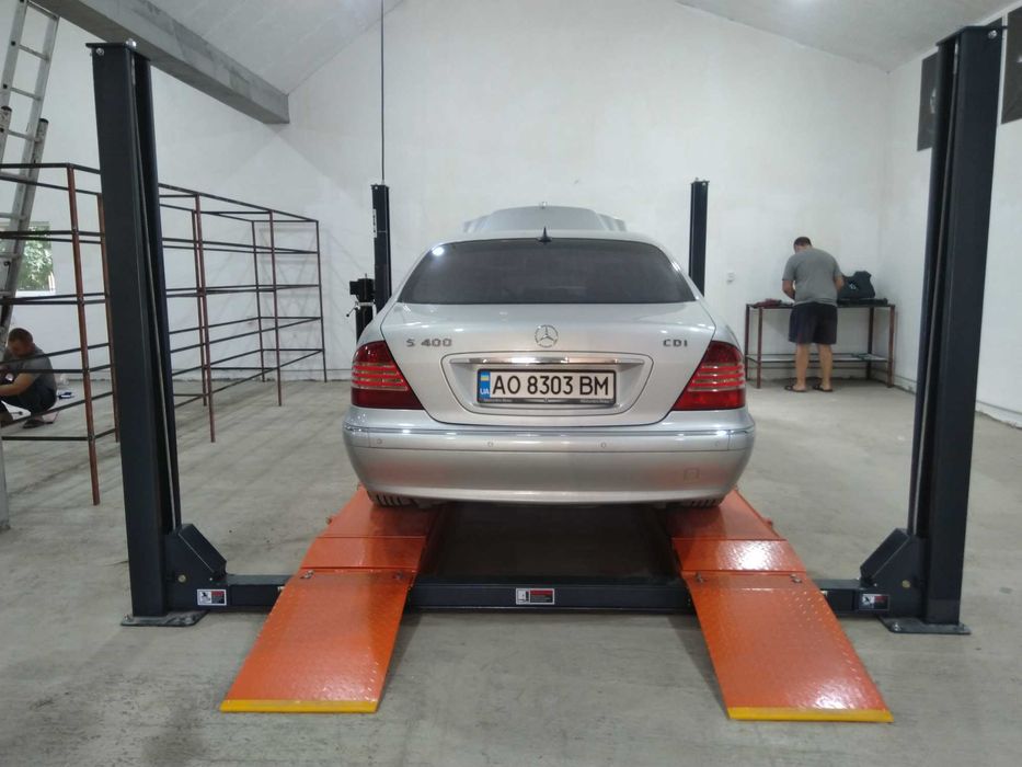 четырехстоичный подъемник для ремонта и для развала-схождения