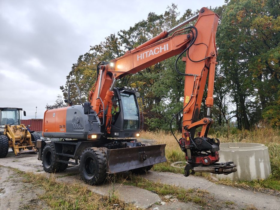 リバーランド Używana koparka kołowa Hitachi ZX140 na sprzedaż, cena