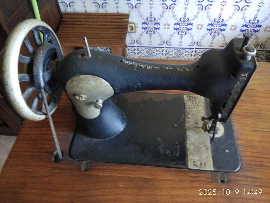 Maquina de costurar antiga singer