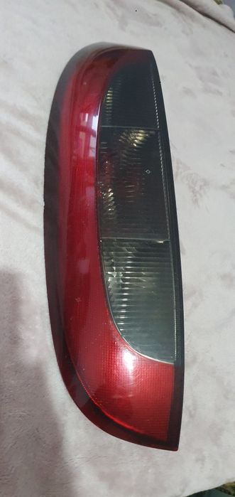 Stop esquerdo opel corsa