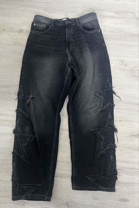 Czarne spodnie z gwiazdkami