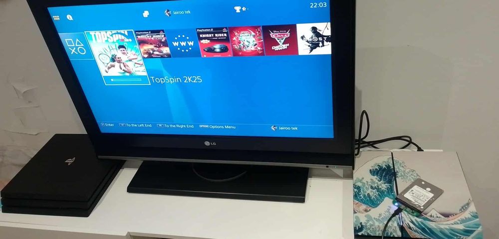 Playstation 4 com 15  jogos pronto a jogar FC26 GTA GOD OF WAR ..