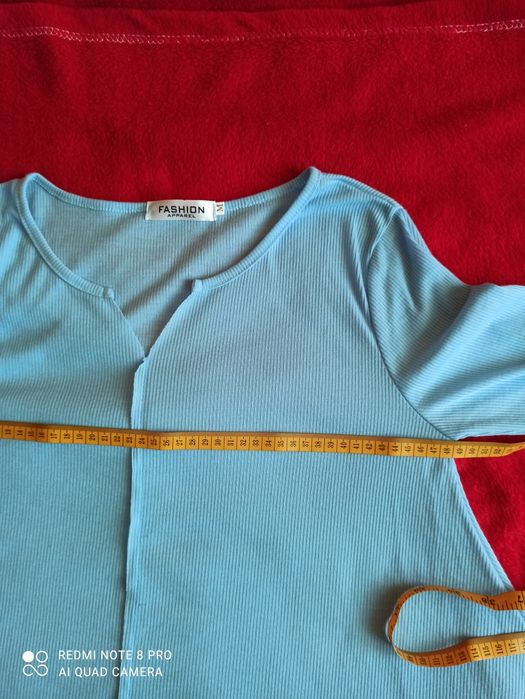 Niebieska bluzka prążek