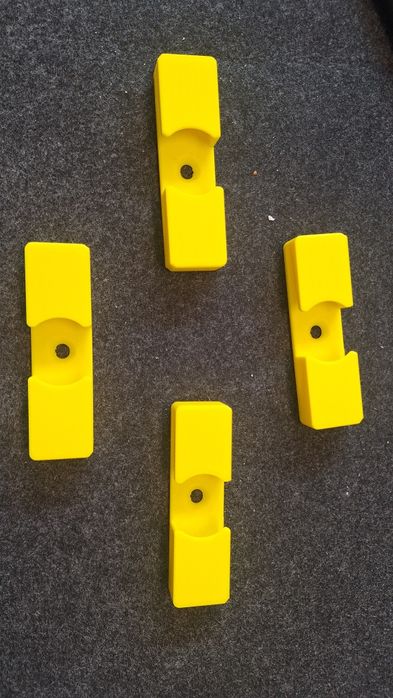 Suporte de parede para carreto de pesca