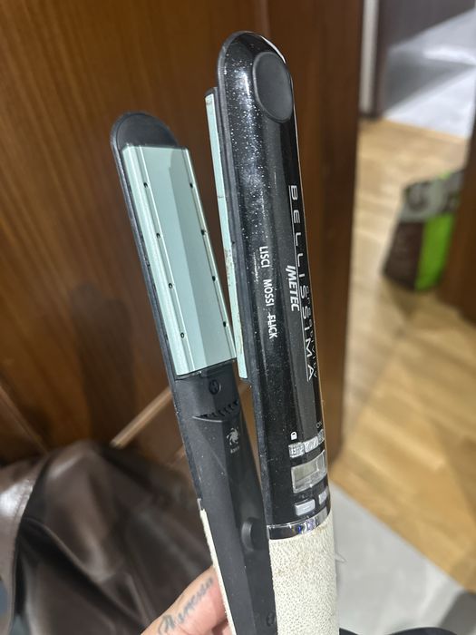 Escova secadora e prancha cabelo