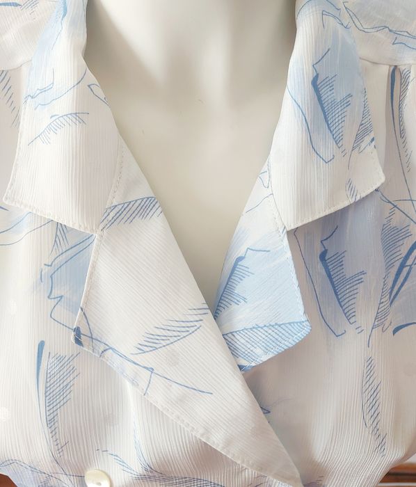 Blusa acetinada estampada