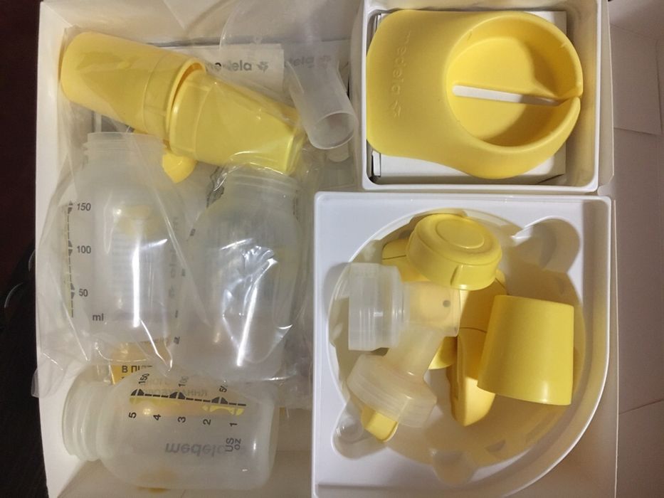 Молокоотсос электрический Medela Mini Electric + бутылочки 150 мл