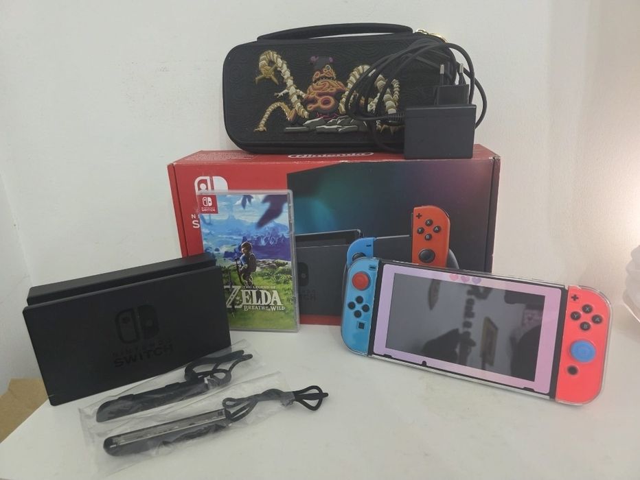Nintendo Switch com jogo Zelda e acessórios