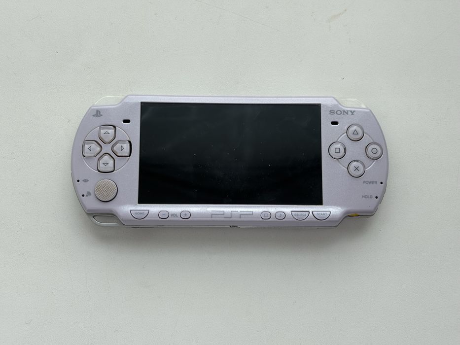 Sony PSP 2000 лавандового кольору 32 gb карта памʼяті