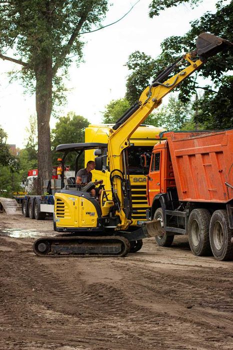 Оренда мініекскаватора — траншеї, котловани, планування території