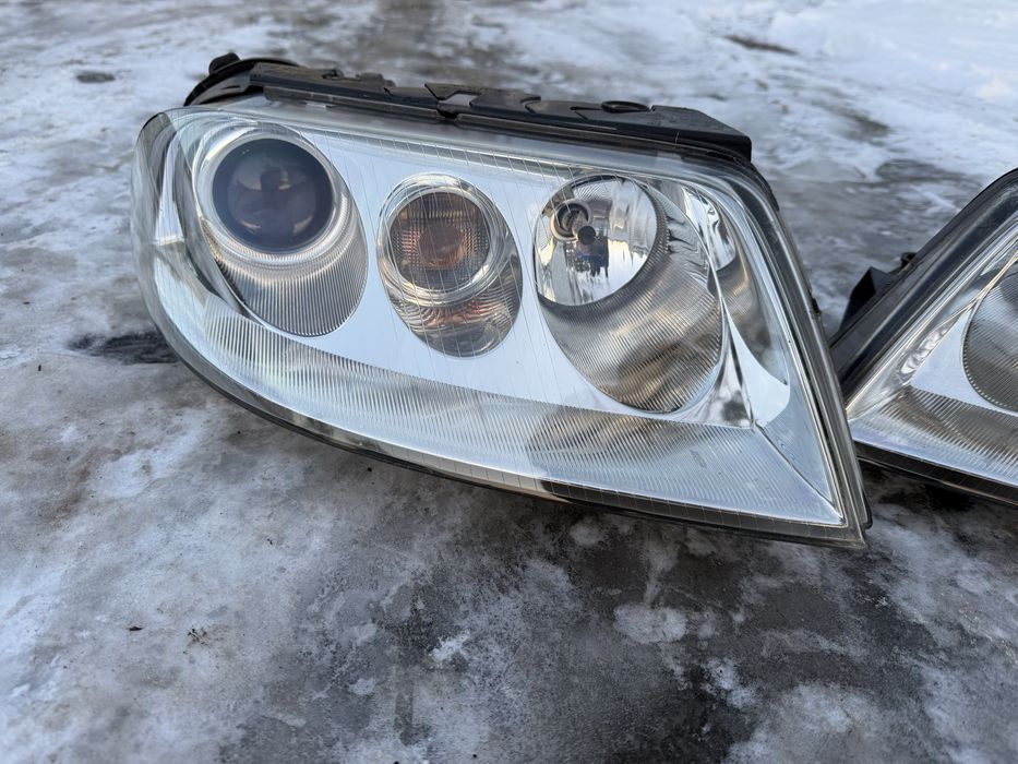 Lampy przednie VW passat b5 fl lift bi xenon EU cale ladne cena za kpl