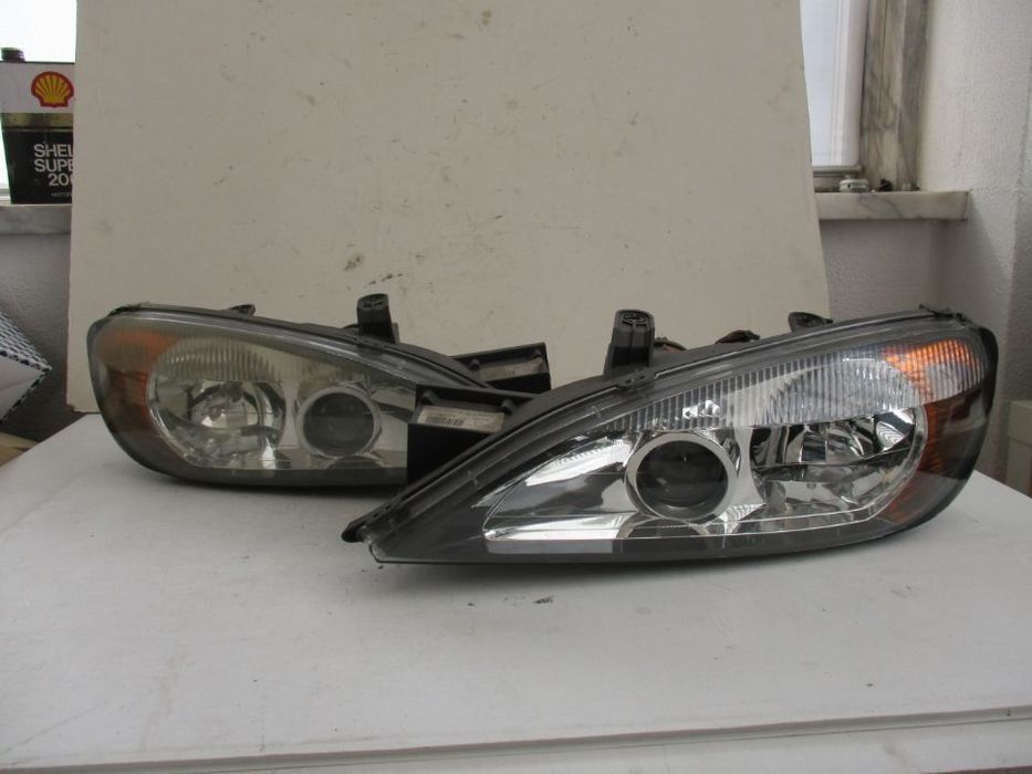 Farol Optica Nissan primera  P11 1999 a 2001 Xénon Direito