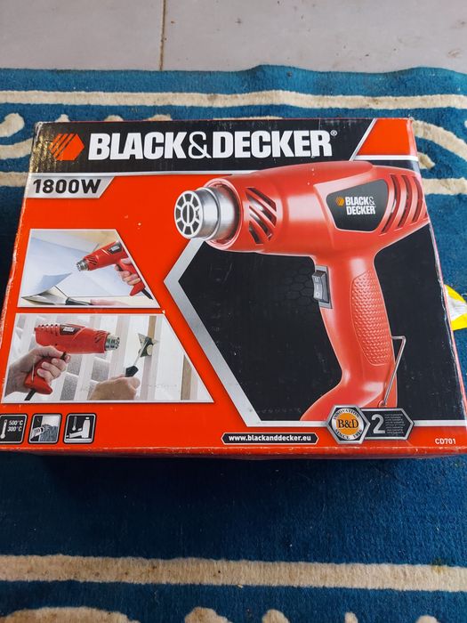 Pistola de ar quente.