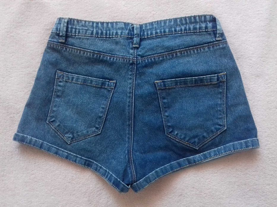 Jasne jeansowe spodenki Sinsay