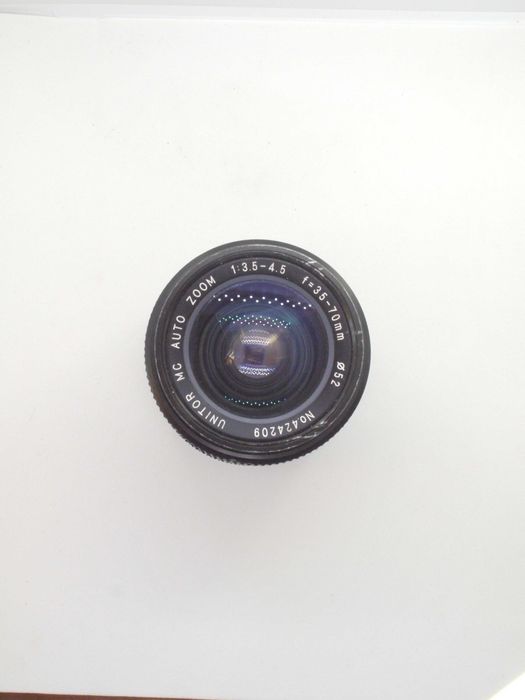 Minolta SRT 101 + Minolta MD Rokkor 50mm f/1.7 + Unitor 35-70mm