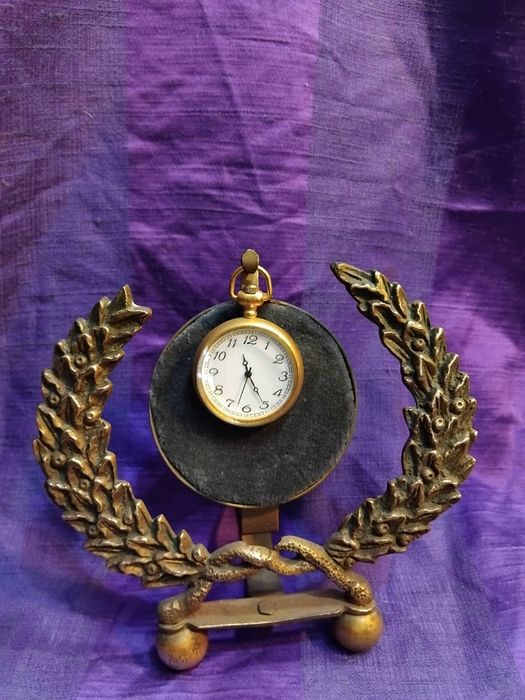 Expositor de relógios de bolso em bronze