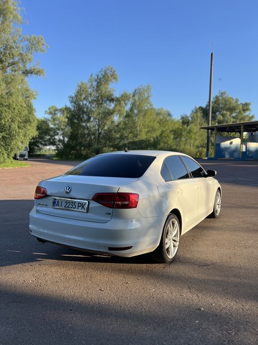 Volkswagen Jetta 2015 1.8 бензин Автомат  Aisin