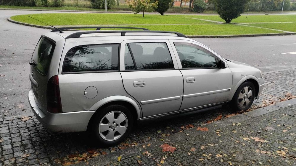 Veiculo opel astra LER ANUNCIO COMPLETO