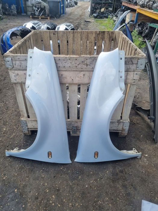 Błotnik prawy przedni Vw Golf IV srebrny