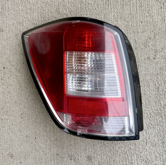 Opel Astra H lift kombi lampa tyl tylna w blotnik lewa lub prawa rolet