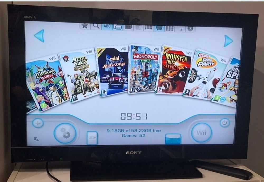 Nintendo Wii com 52 jogos digitais.