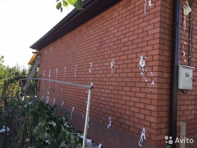 Утеплення Піноізолом Задувка пустот піною  стіни горища