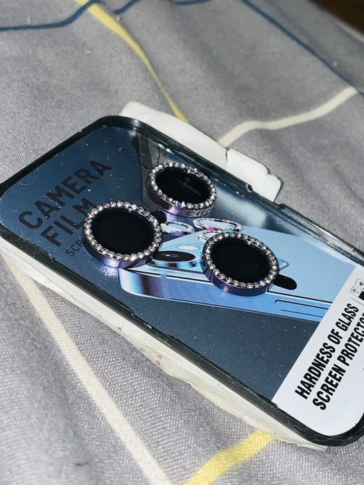 Захисне скло на камери iPhone 14 Pro з білими камінчиками