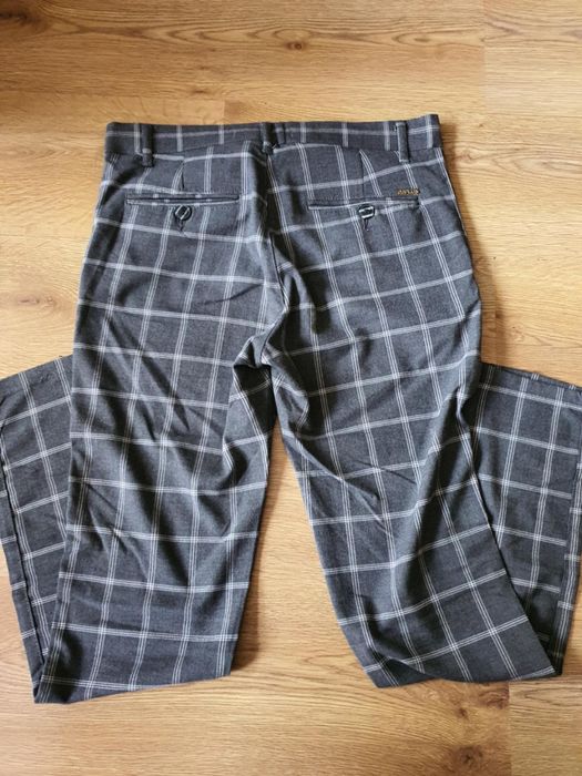 Eleganckie spodnie w kratę męskie rozm 32