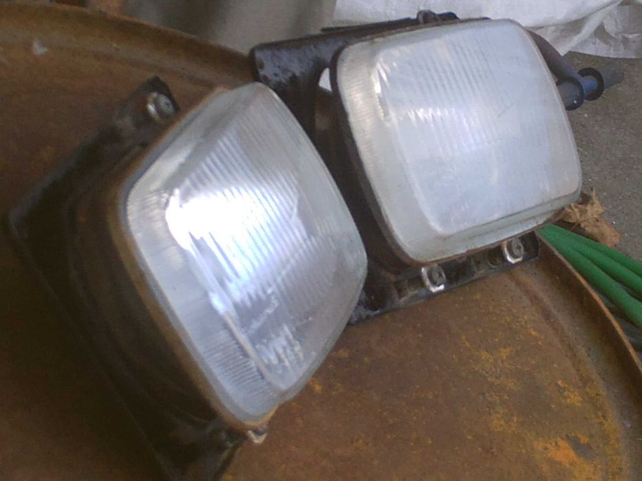 dois farois originais para trator fiat