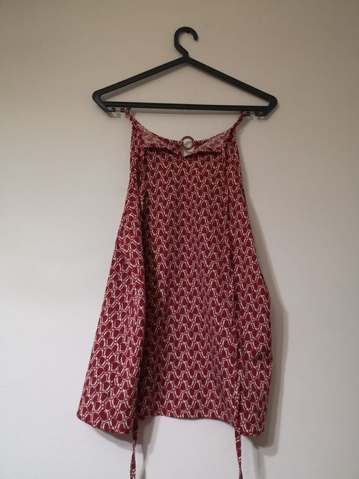 Túnica, tamanho L. Nova.