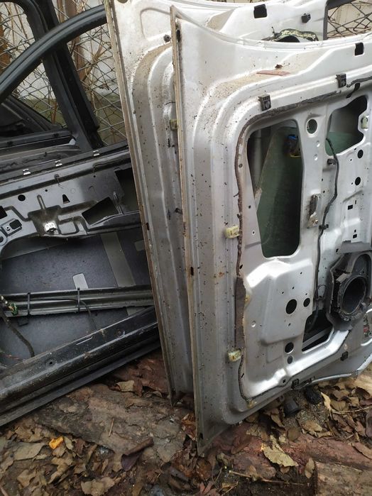 Дверка ліва перед Форд Ескорт Мк7 Escort Mk7