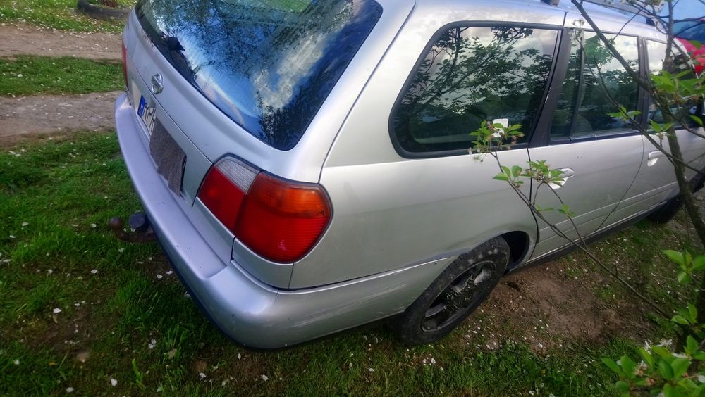 Nissan Primera p 11 двері Запчастини