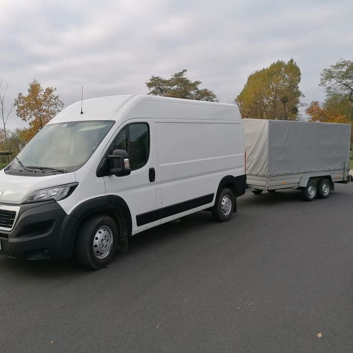 Transport usługi tran przewóz towarów rzeczy laweta platforma  dłużyca