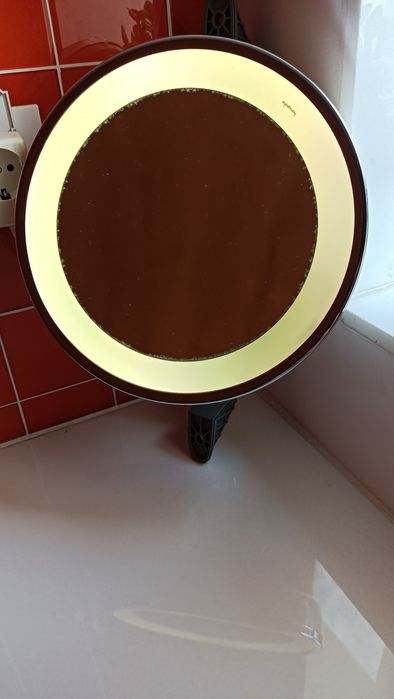 Espelho de aumento eléctrico