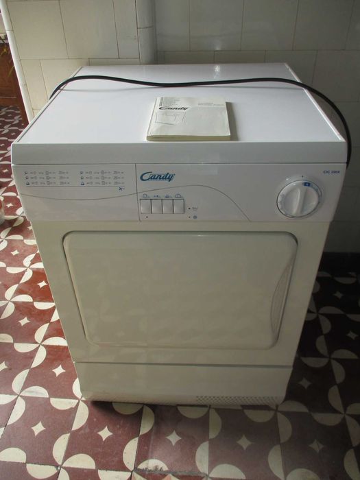 Máquina de Secar Roupa Candy vcom Manual de Instruções