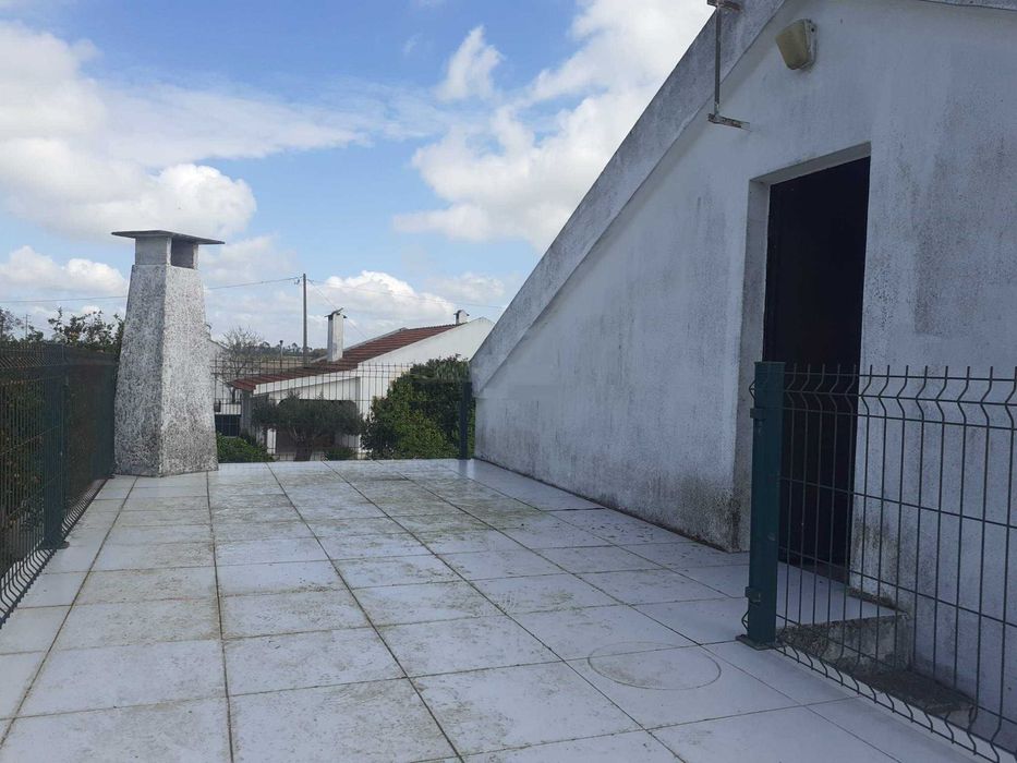 Terreno com Moradia
