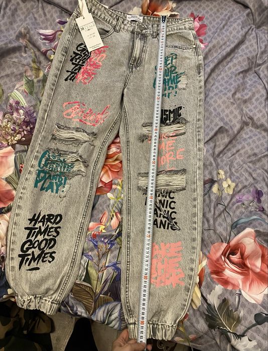 Super spodnie jeans przetarcia Nowe Graffiti rozmiar 38
