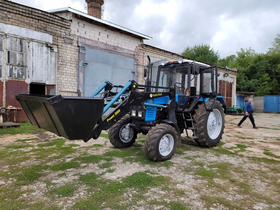 Быстросйомный фронтальный погрузчик кун Юмз