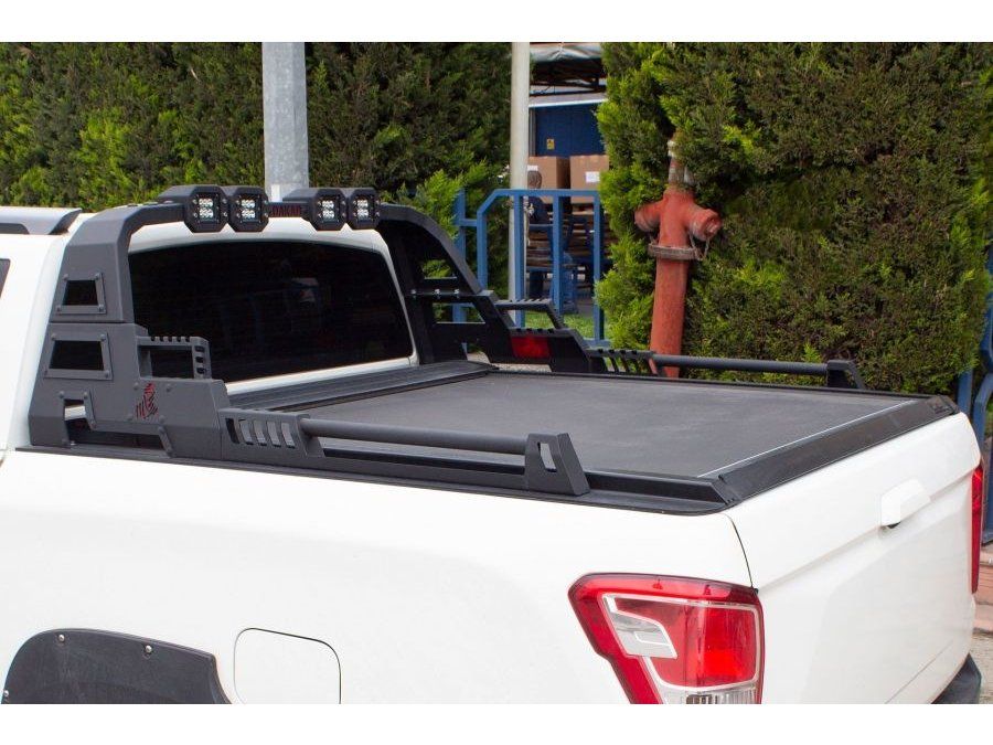 Toyota Hilux 2015- рр. Ролбар Dakar з LED (під ролети)