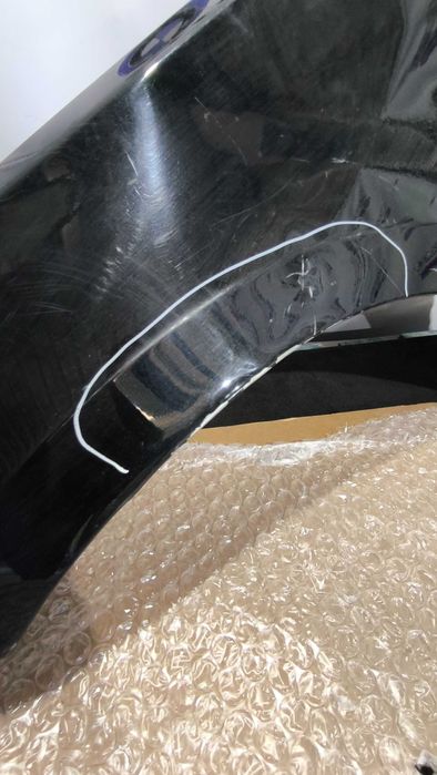 Guarda Lamas BMW (E81/E82/E87/E88) Esquerdo (Com defeito)