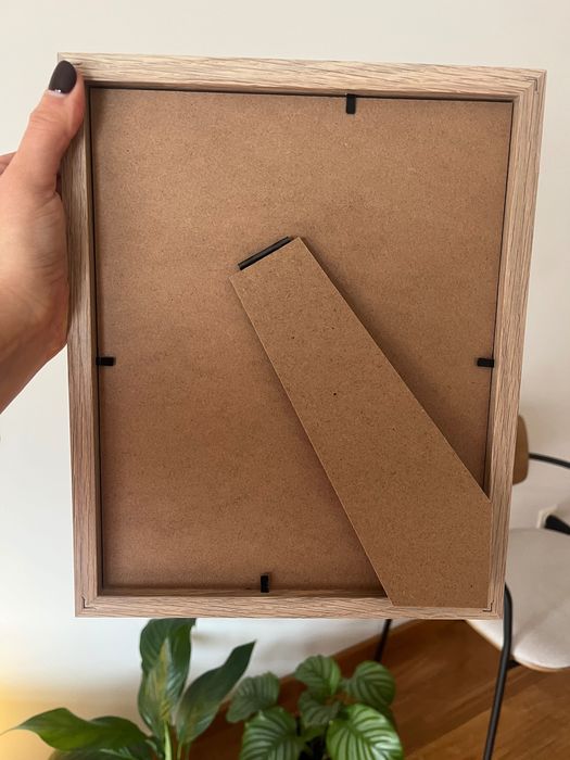 Quadro com tela e búzio