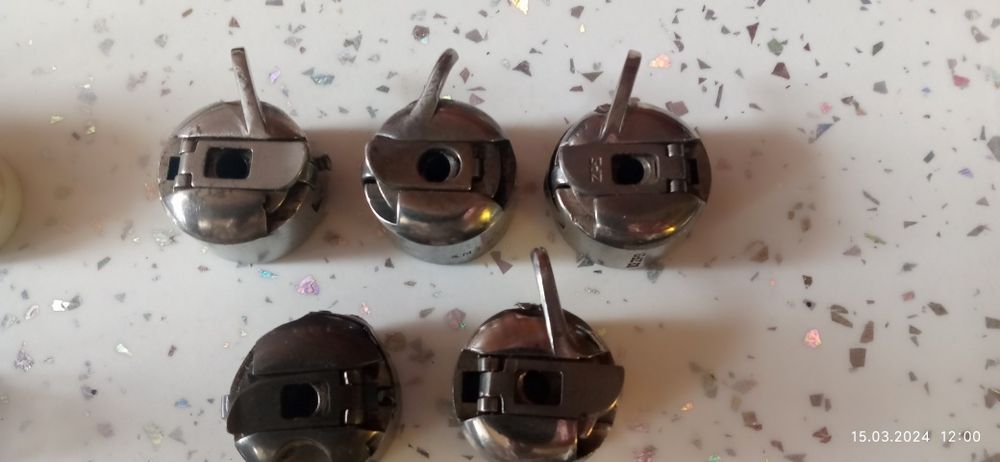 Запчасти швейной машинки.