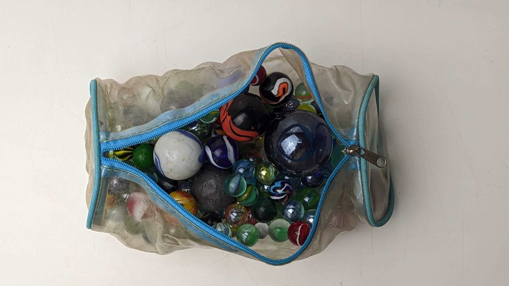 Saco cheio de berlindes