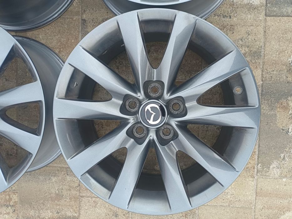 Oryginalne felgi aluminiowe Mazda, R17 5x114.3, ET 50, dekielki