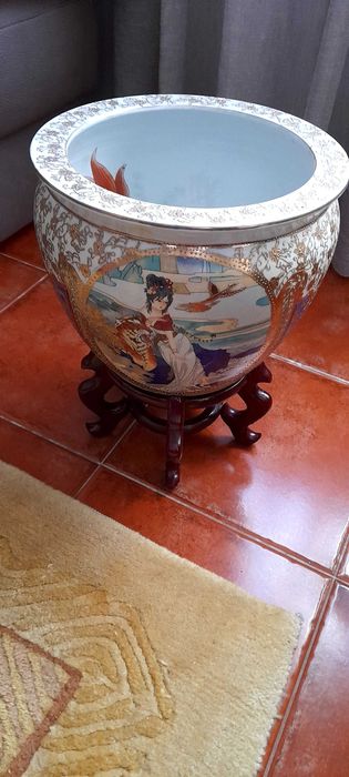 Vaso chinês e pianha