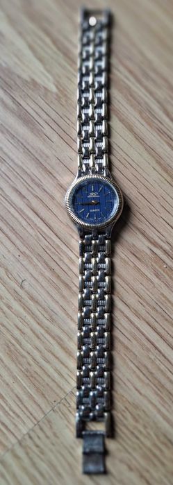 Relógio Seiko bicolor prateado dourado mostrador azul