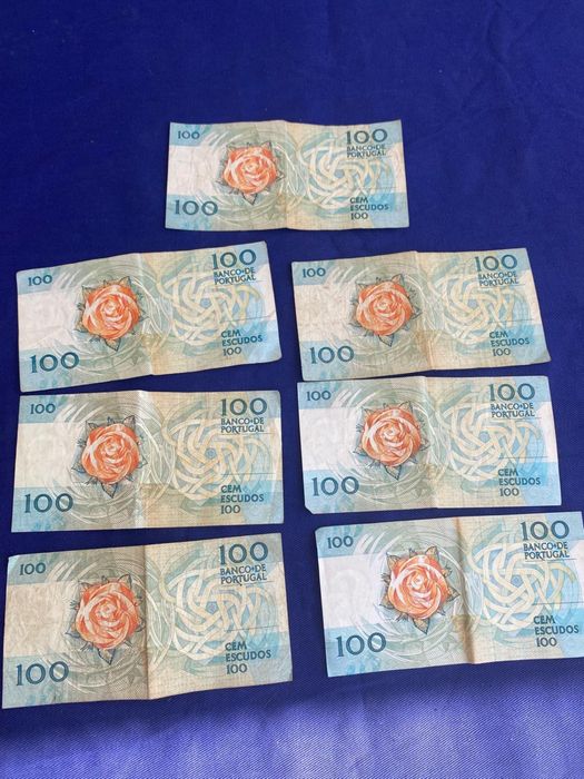 7 Notas de 100 escudos