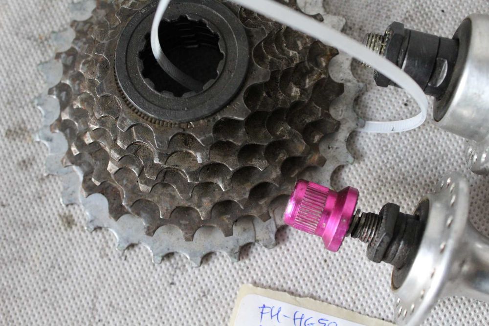 BUDŻET PIASTy rowerowe 7s 100/135mm 36H + kaseta hyperglide DB2