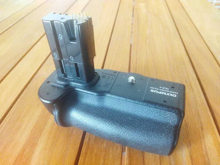 Vários Olympus (bcm-2,  grip HLD-4, RM-UC1)